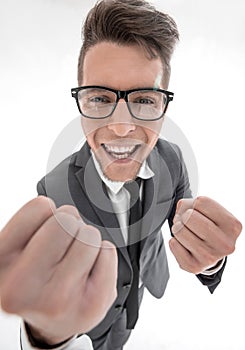 Businessman celebrating with his fists raised in the air