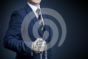 Businessman with chain on his hand