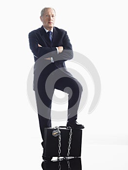 Businessman With Chained Briefcase