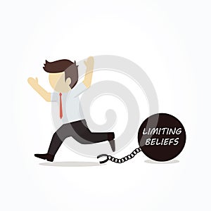 Businessman chained to his limiting beliefs.