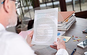 Businessman checking a document