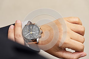 Businessman checking the time