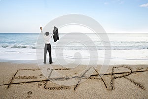 Businessman cheering with fear word deleted line on sand beach