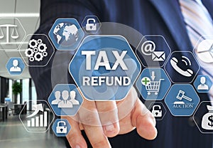 The businessman chooses TAX REFUND on the virtual screen in social network connection