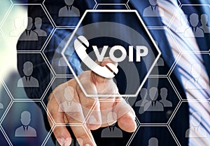 The businessman chooses VOIP on the virtual screen in social network connection