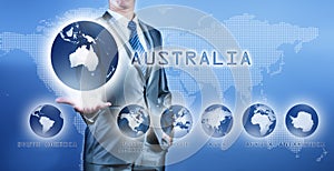 Businessman choosing australia continent