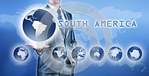 Businessman choosing south america continent