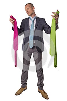 Businessman choosing tie isolated on white background