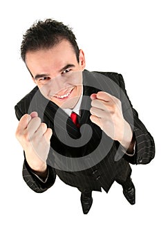 Businessman clenching fists photo