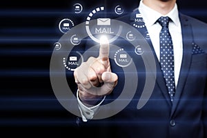 Businessman clicking on email icon