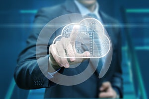 Businessman clicks on a data cloud .