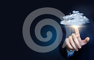 Businessman clicks on a data cloud.