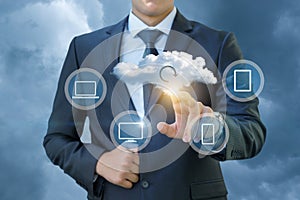 The businessman clicks on a data cloud .