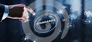 Businessman clicks Standards Quality assurance and control concept
