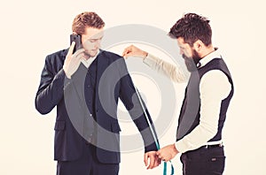 Businessman, client on busy face speak on phone, smartphone