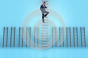 The businessman climbing career ladder in business success concept
