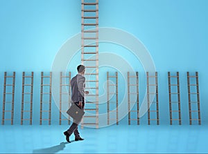 Businessman climbing career ladder in business success concept