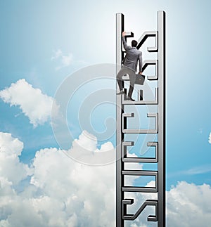 Businessman climbing the career ladder of success