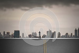 Businessman climbing on ladder over city looking ahead, Leadership concept