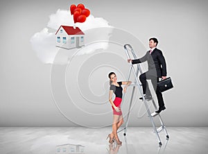 Businessman climbing a ladder