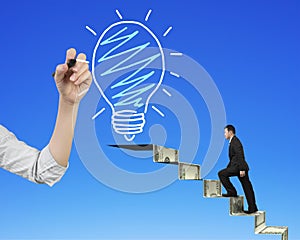 Businessman climbing money stairs toward light bulb hand drawing