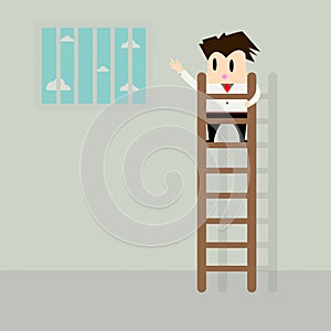 Businessman climbing stairs to freedom
