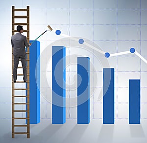 Businessman climbing towards growth in statistics