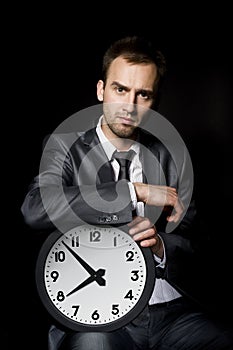 Businessman with clock