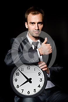 Businessman with clock