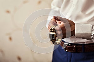 Businessman clock clothes, businessman checking time on his wris