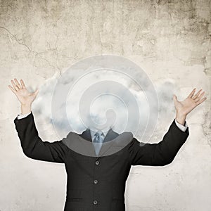 Businessman with cloud on head