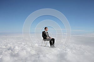 Businessman on a cloud