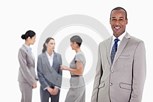 Businessman with co-workers talking