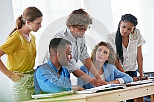Businessman, coaching and documents in team strategy, planning or training staff at office. Business people listening to