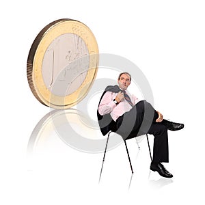 Businessman with a coin