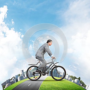 Businessman commuting to work by bike