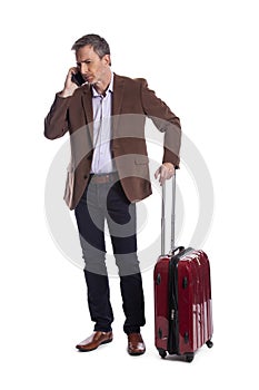 Traveling Businessman Calling for a Rideshare photo