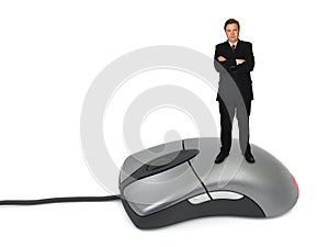 Businessman on computer mouse