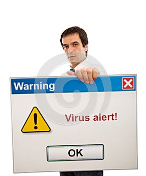 Businessman with computer virus alert