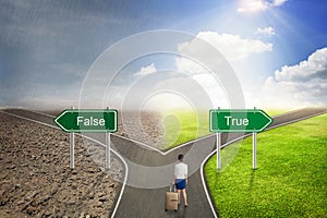 Businessman concept, False or True road to the correct way.
