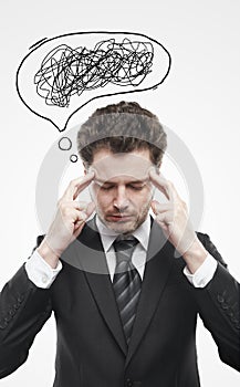 Businessman with confusing tangle of thoughts