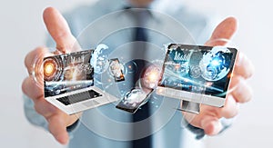 Businessman connecting tech devices to each other 3D rendering