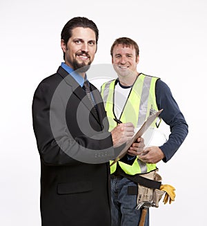 Businessman and construction worker posing for the camera