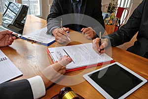 businessman consult lawyer & sign contract agreement. judge gave