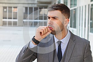 Businessman coughing in office space