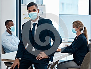 Businessman with covid face mask in meeting, leader in training workshop and coaching employees in compliance with rules