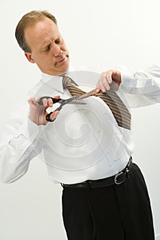 Businessman Cutting Tie