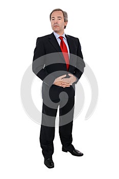 Businessman in dark suit and red tie