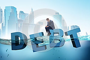 The businessman in debt business concept