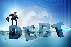 The businessman in debt business concept